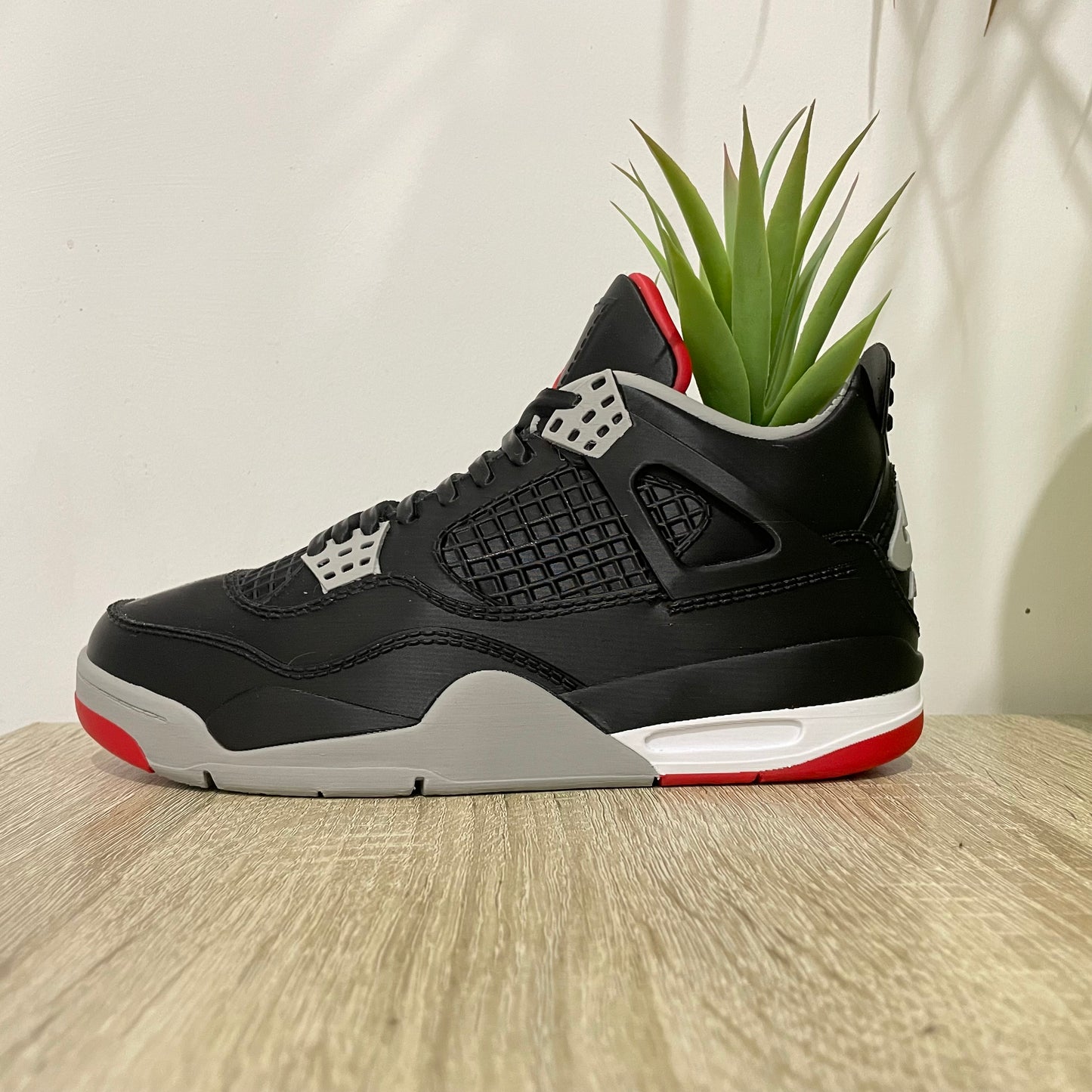 Jordan 4 Bred planter