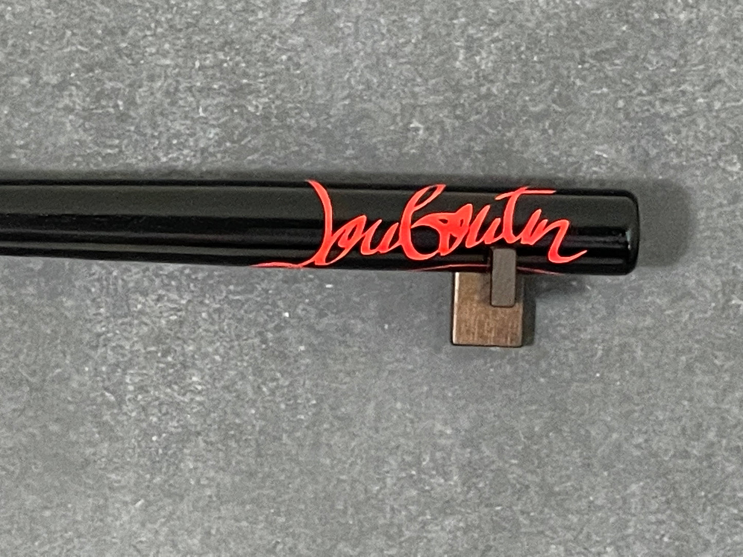 Louboutin Baseball Bat